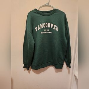 green crewneck sweatshirt